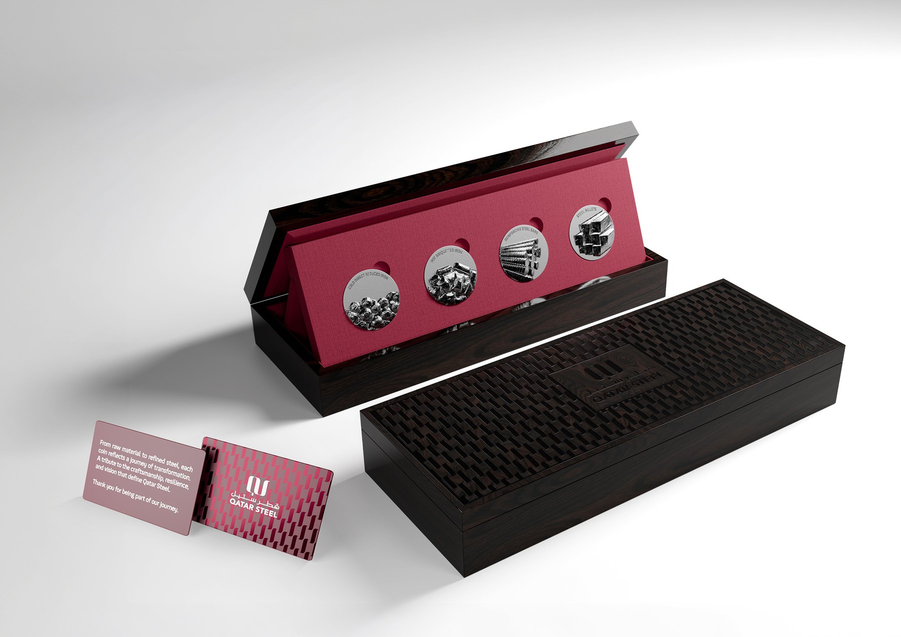 Qatar Steel VIP packaging set with coins, box, bag, and card